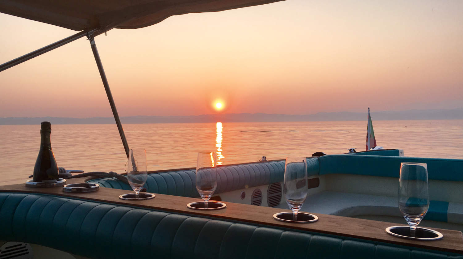 Sail on Lake Garda at sunset